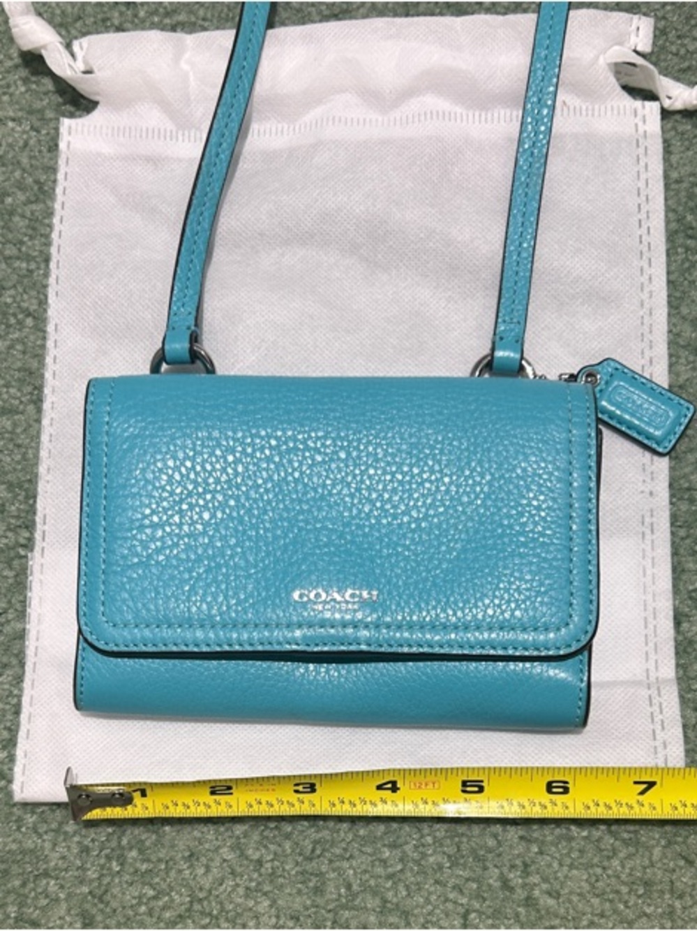 COACH Anna Robin’s Egg Blue Pebbled Leather Foldover Crossbody Bag.